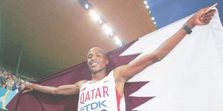 Saif Saaeed Shaheen of Qatar celebrates after winning the gold medal