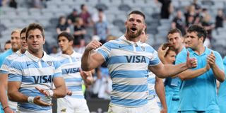 Argentina's Marcos Kremer (centre) celebrates victory with teammates.