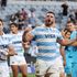 Argentina's Marcos Kremer (centre) celebrates victory with teammates. 