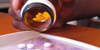 Pharmacist dispenses drugs