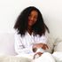 Young woman in bed
