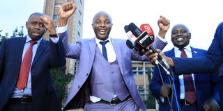 Aenators John Kinyua, Irungu Kangata and Samson Cherarkey celebrate after the passing of the county revenue allocation formula.