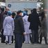 WHO officials at Wuhan hospital