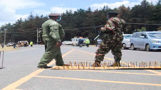 Police officers at Mau Summit junction