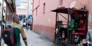 Shoe shiners along Safi Lane