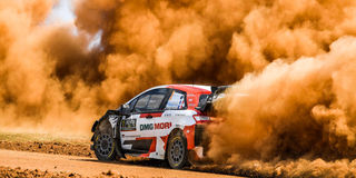 French driver Sebastien Ogier steers his Toyota Yaris WRC