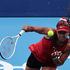 Japan's Naomi Osaka serves to Switzerland's Viktorija Golubic