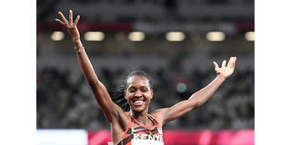Kenya's Faith Kipyegon reacts after winning the women's 1500m final