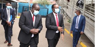 Interior Cabinet Secretary Fred Matiang'i (left) and his PS Karanja Kibicho