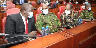 Interior Cabinet Secretary Fred Matiang'i (left) and his PS Karanja Kibicho