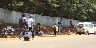 Students leave the Moi University main campus