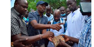 William Ruto money