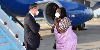 Wang Yi and Raychelle Omamo