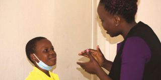 Susan Mujjawa, Blessing Atwijuka , Hand in Hand Special Needs Education Centre, uganada