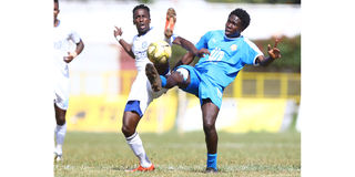 Sofapaka defender Titus Achesa (left) vies for the ball with Nairobi City Stars defender Kevin Okumu