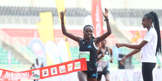 Irene Kamais wins the women's 21km race