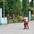 Kilifi county residents walk outside the Pwani Oil Company plant