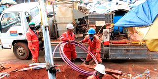 Workers laying fibre optic cable in Nyeri town