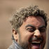 A rally fan smiles inside dust at Kedong stage in Naivasha