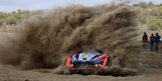 Estonia’s Ott Tanak navigated by Martine Jarveoja racing on a Hyundai i20