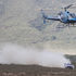 A helicopter patrols the route 