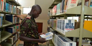 Senior Cadet Daniel Nyangige at the National Defence University of Kenya Library in Lanet on July 15.