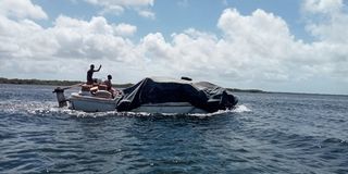 boat passing through Manda Bruno channel in Lamu