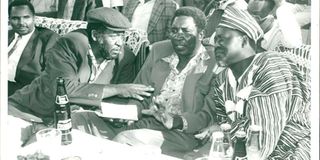 Lang'ata MP Raila Odinga (right) Molo MP Njenga Mungai (left) and Kiambu FORD Kenya chairman Nginyo Kariuki