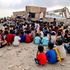 Children attend classes outdoors in Yemen