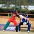 Kenya's batsman Irfan Karim (left) bats under pressure from Nepal's Wicketkeeper Aarif Sheikh 