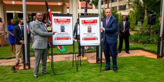 Director of Criminal Investigations George Kinoti and Mr Eric Kneedler, the Chargé d'Affaires at the US Embassy, Nairobi.