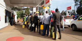 Bodaboda operators line up to buy fuel at a Nyeri petrol station.