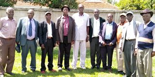 Tachoni Cultural Society (TACUSO) elders led by chairman Patrick Lichuma Sitati (tall in white suit)