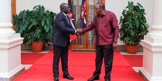 President William Ruto (left) and former President Uhuru Kenyatta at State House, Nairobi