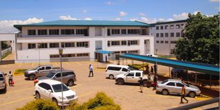 Trans Nzoia Governor George Natembeya with health officials during a tour of the new County referral hospital