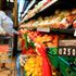 A customer picks fruits at Naivas Supermarket in Nyeri. 