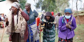 Elderly women after receiving relief food disbursed by the government