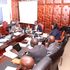 Governor George Natembeya (centre) and his deputy Philomena Bineah Kapkor meeting pending bills team
