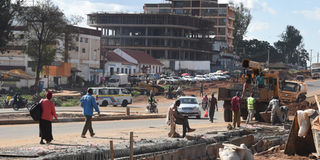 Workers putting up a drainage in Kitale town, Trans Nzoia County along the Kitale-Endebess-Suam-Uganda road