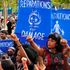Climate activists demonstrate at the Sharm el-Sheikh International Convention Centre, Egypt