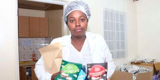 Judy Mugure from Kinoo in Kiambu displays coconut chips which she makes from raw coconut.