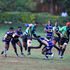 Kabras Sugar RFC forward Eugene Sifuna (centre) charges past Mean Machine's defenders 