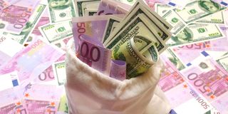 US dollars and euro bills