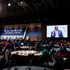 Participants at the US-Africa Leaders Summit watch President William Ruto on huge screens