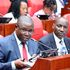Teachers Service Commission Chairman Jamleck Muturi and Director of Legal and Industrial Relations Calvin Anyuor