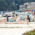 Farmers dry their maize near Kipchoge Keino Stadium in Eldoret town, Uasin Gishu County