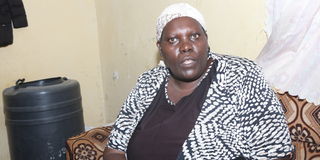 Marion Njeri speaking to Nation journalists at Pakawa estate Pipeline, Nakuru County