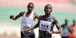 Samuel Kibathi crosses the finish line