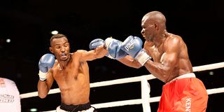Tanzania's Shabani Ndaro fights against Kenya's Rayton Okwiri