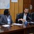 Helios Investment principal partner Pierre Heinrich (right) speaks during the acquisition deal signing of the sale of shares